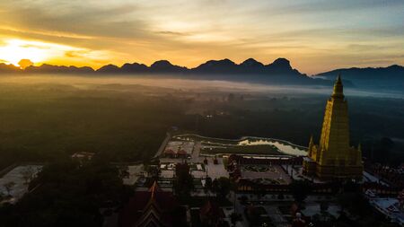 Aerial photo  of Beautiful temples in the morning atmosphere , Thailand .の写真素材