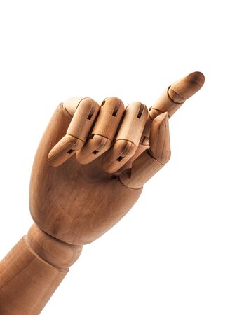 hand of wood doll make fingers to touch on white bakground .の写真素材