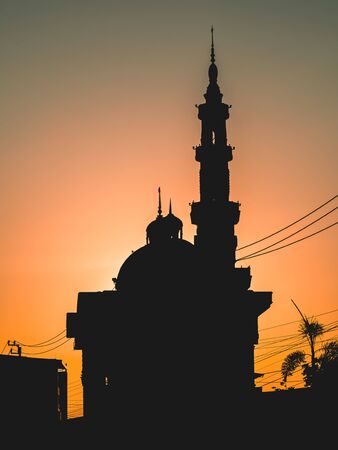 Silhouette of the mosque in the morning .の写真素材