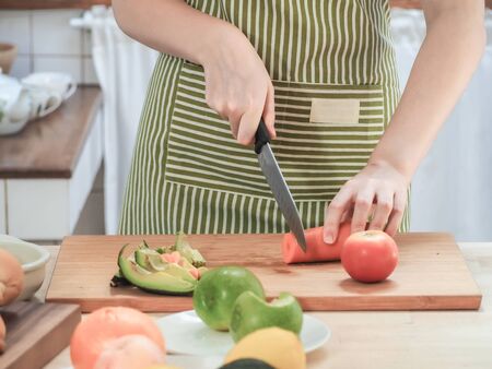 close up  female hand cook in the kitchen .