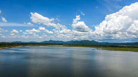 High angle view Aerial view of reservoir Dam with Beautiful sky , Thailandの写真素材