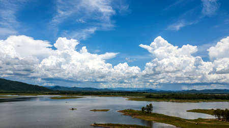 High angle view Aerial view of reservoir Dam with Beautiful sky , Thailandの写真素材