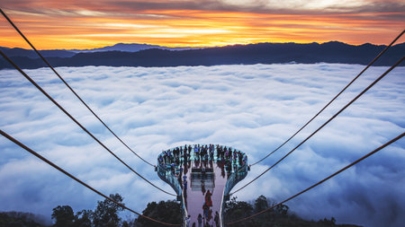 Betong, Yala, Thailand  2020: Talay Mok Aiyoeweng skywalk fog viewpoint there are tourist visited sea of mist in the morningの素材 [FY310182007264]