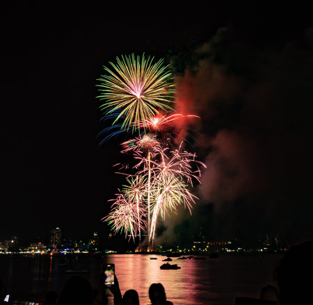 Abstract colored firework background light up the sky with dazzling displayat Pattaya Thailand