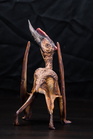The Dsungaripterus dinosaur  in the darkの写真素材