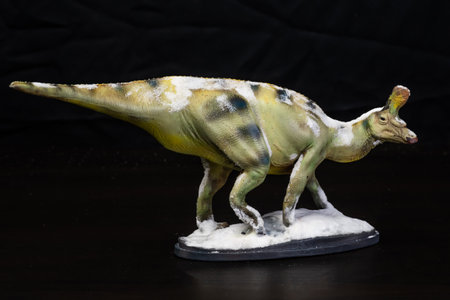 The Tsintaosaurus dinosaur  in the darkの写真素材