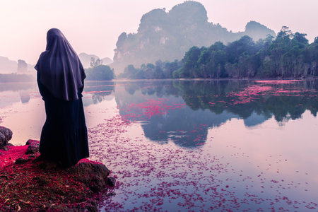 Landscape Nature View of Nong Thale Lake and islamic woman or muslim in Krabi Thailandの写真素材
