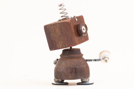 Wooden robot toy on isolated background .の写真素材