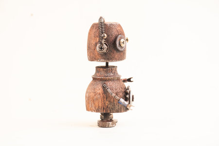Wooden robot toy on isolated background .の写真素材
