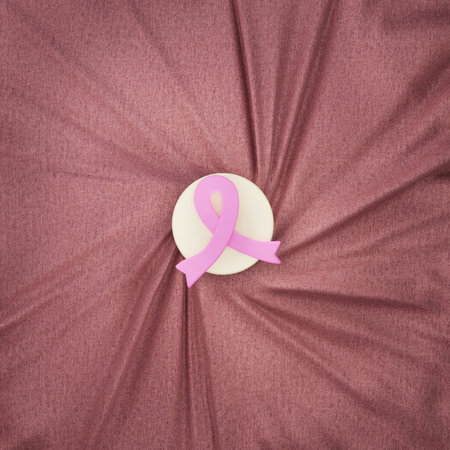 Pink ribbon symbol on fabric, breast cancer awareness, 3d render illustration.の写真素材