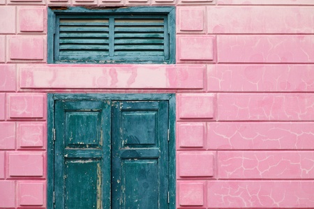 Vintage Green Window on Old Pink Wallの写真素材