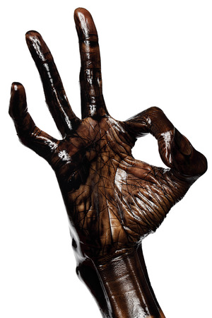 hand showing OK sign isolated on white backgroundの写真素材