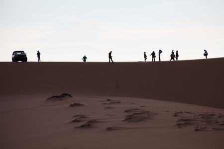 Photo of Sand Dunes with Travellers, Mui Ne, Vietnamの写真素材