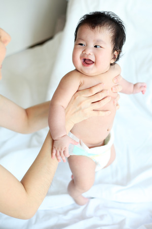Joyful happy mom and baby, Portraitの写真素材