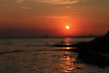 Sunset at sea on a evening.の写真素材