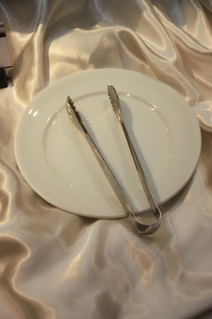 A pinch of food on dish の写真素材