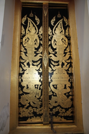 Faerie Pattern Thailand Thai art on a window shutter in a templeの写真素材