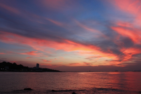 Sunset at sea, leaving the last light before darkの写真素材