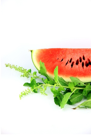 Watermelon which are sliced into pieces and have a seed.の写真素材