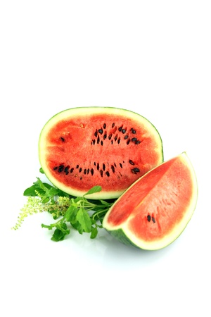 Watermelon which are sliced into pieces and have a seed.の写真素材