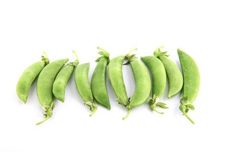 The Green peas on a white background.の写真素材