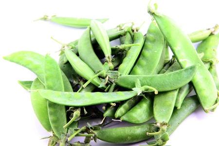 The Green peas on a white background.の写真素材
