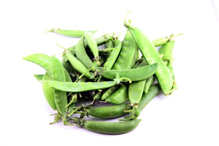 The Green peas on a white background.の写真素材