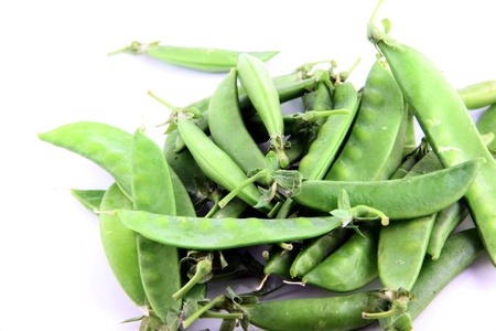 The Green peas on a white background.の写真素材