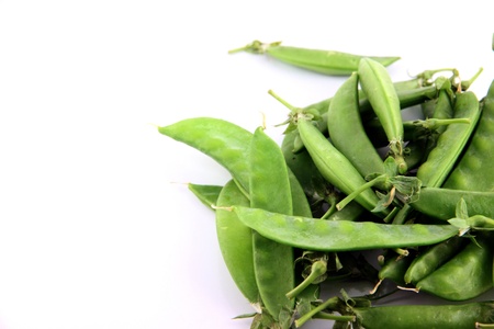 The Green peas on a white background.の写真素材