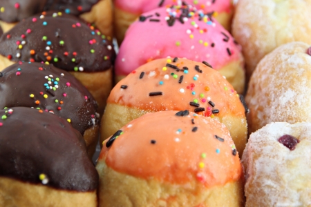 Many donuts flavor combinations on the white background.の写真素材