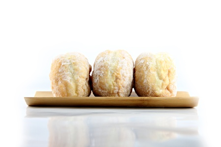 The Blueberry donuts on bamboo dish.