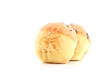 Orange cream donuts on the white background.の写真素材