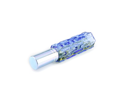 The Blue bottle of perfume on white background.