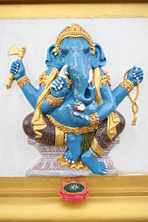 Blue Statue Ganesh in the temple on the wall.の写真素材