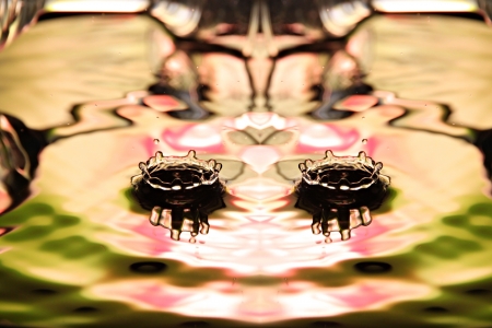 Closeup Pictures Two water drops a beautiful shape Crown in Basin.