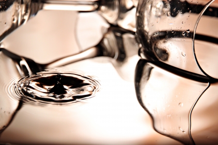 Closeup Pictures water drops a beautiful shape in Basin on bright colors background.の写真素材