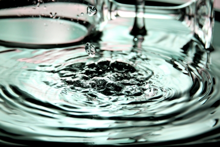 Closeup Pictures Pour water into the basin and water splash beautiful shape.の写真素材