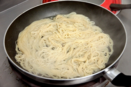 The Picture Cooking foods is Noodle Puff in pan の写真素材