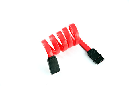 The Red SATA cable on the white background 