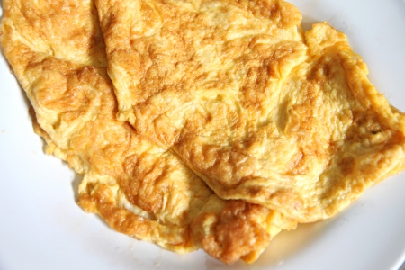 This a Thai foods,The Omelette on white dish.