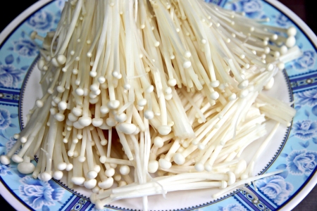 The Picture Golden needle mushroom in dish and Prepared for cooking の写真素材