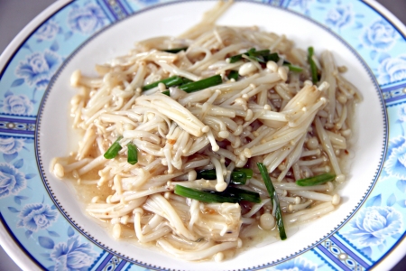 Mushrooms mixing with pepper and basil, Local food in Thailand.の写真素材