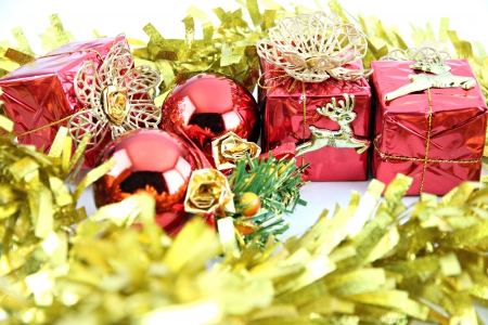 Golden ribbon and red gift box for Christmas or new year. の写真素材