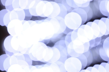White lights blurry bokeh abstract of background.の写真素材