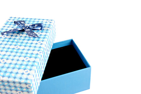 Blue gift box with a lid isolated on white background の写真素材