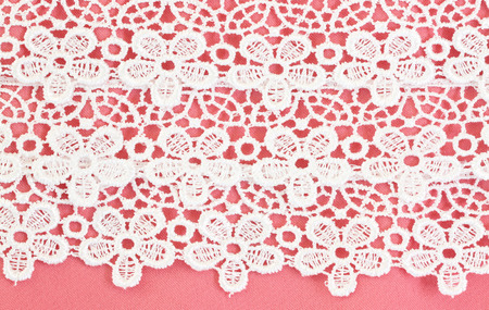 White flower pattern on Pink fabric for the background.  の写真素材