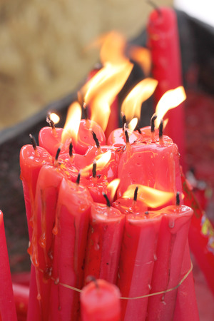 many red candle of burning の写真素材