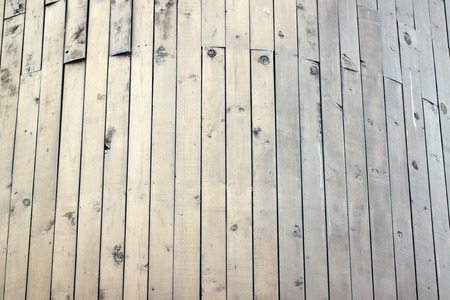 Wooden planks arranged in a line for background.