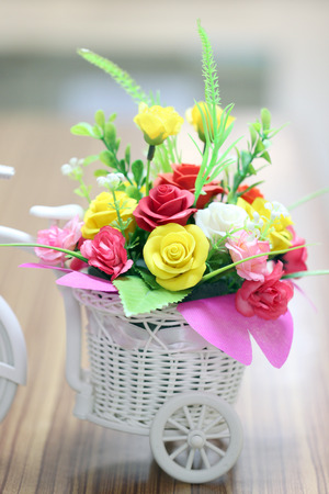 artificial flowers of modern in white bicycle vases style.の写真素材