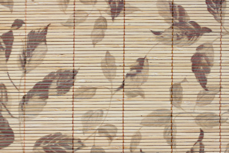 the pattern leaves on bamboo wood of background.の写真素材